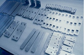 What are the basic processes in sheet metal manufacturing industry?